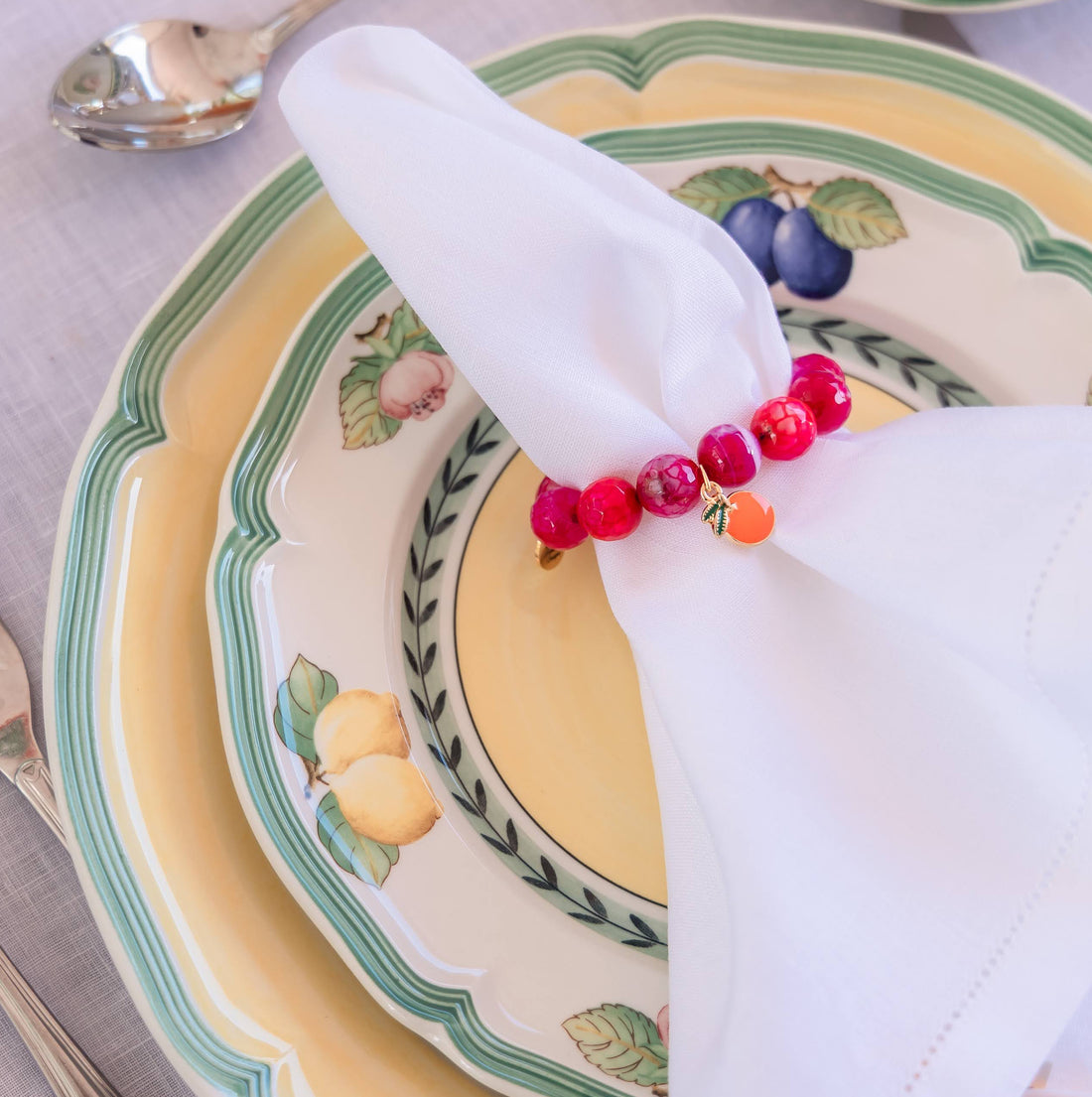 Magenta Jage semiprecious stone napkin ring with enameled orange tag (set of 4)