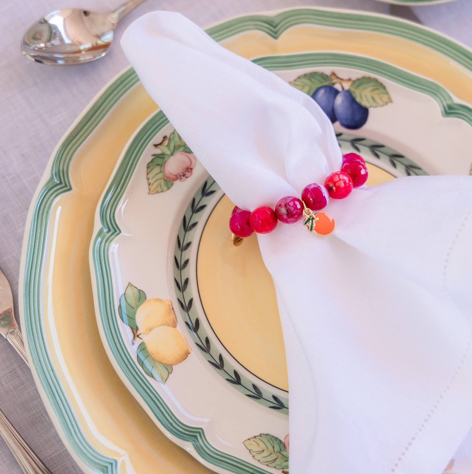 Magenta Jage semiprecious stone napkin ring with enameled orange tag (set of 4)