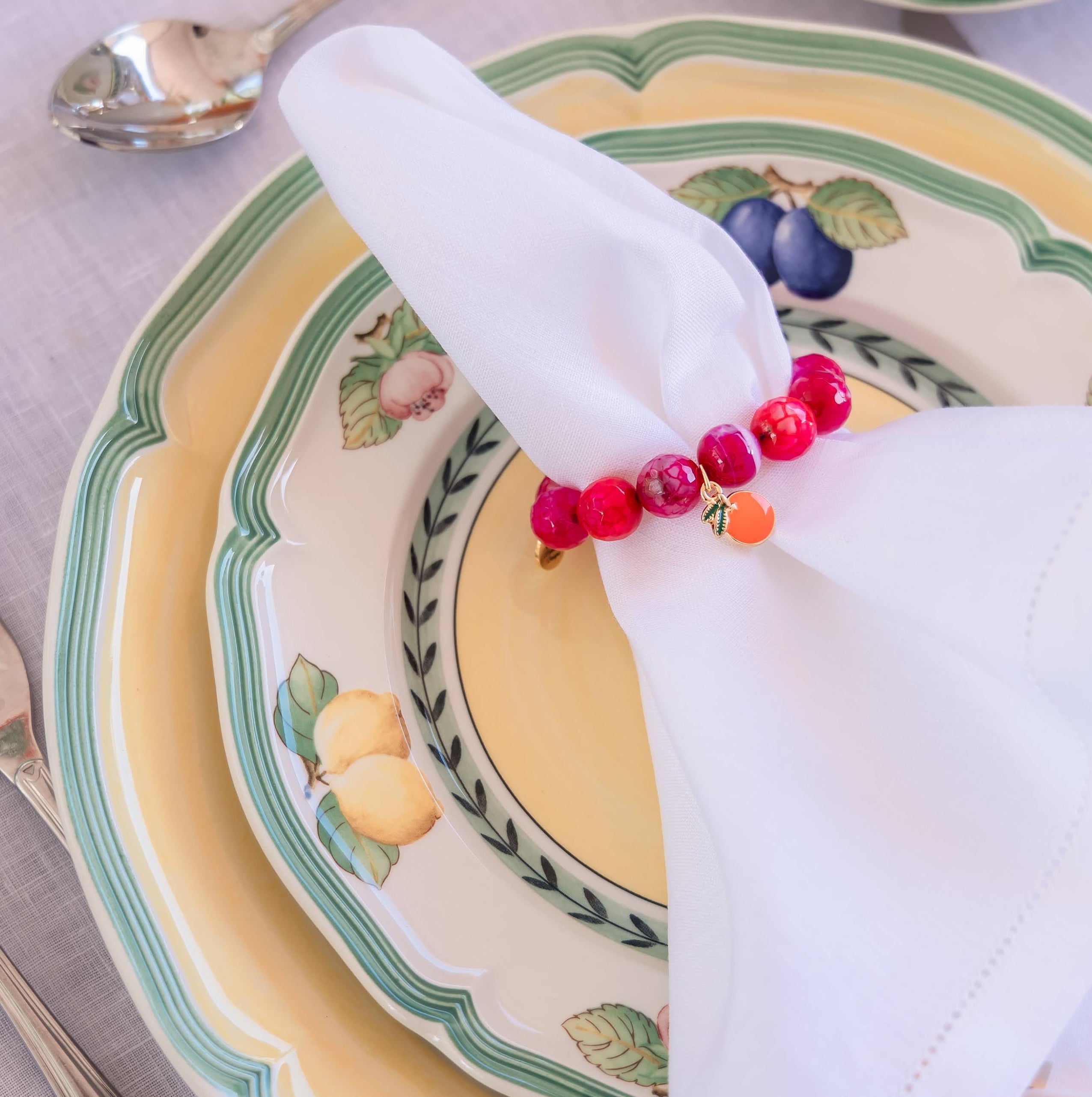 Magenta Jage semiprecious stone napkin ring with enameled orange tag (set of 4)