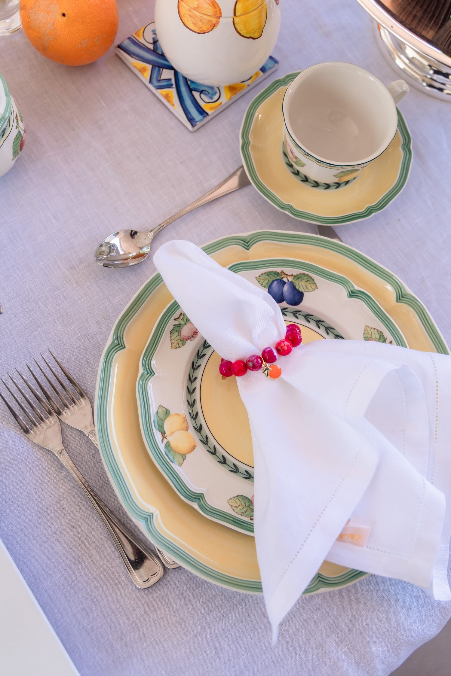 Magenta Jage semiprecious stone napkin ring with enameled orange tag (set of 4)
