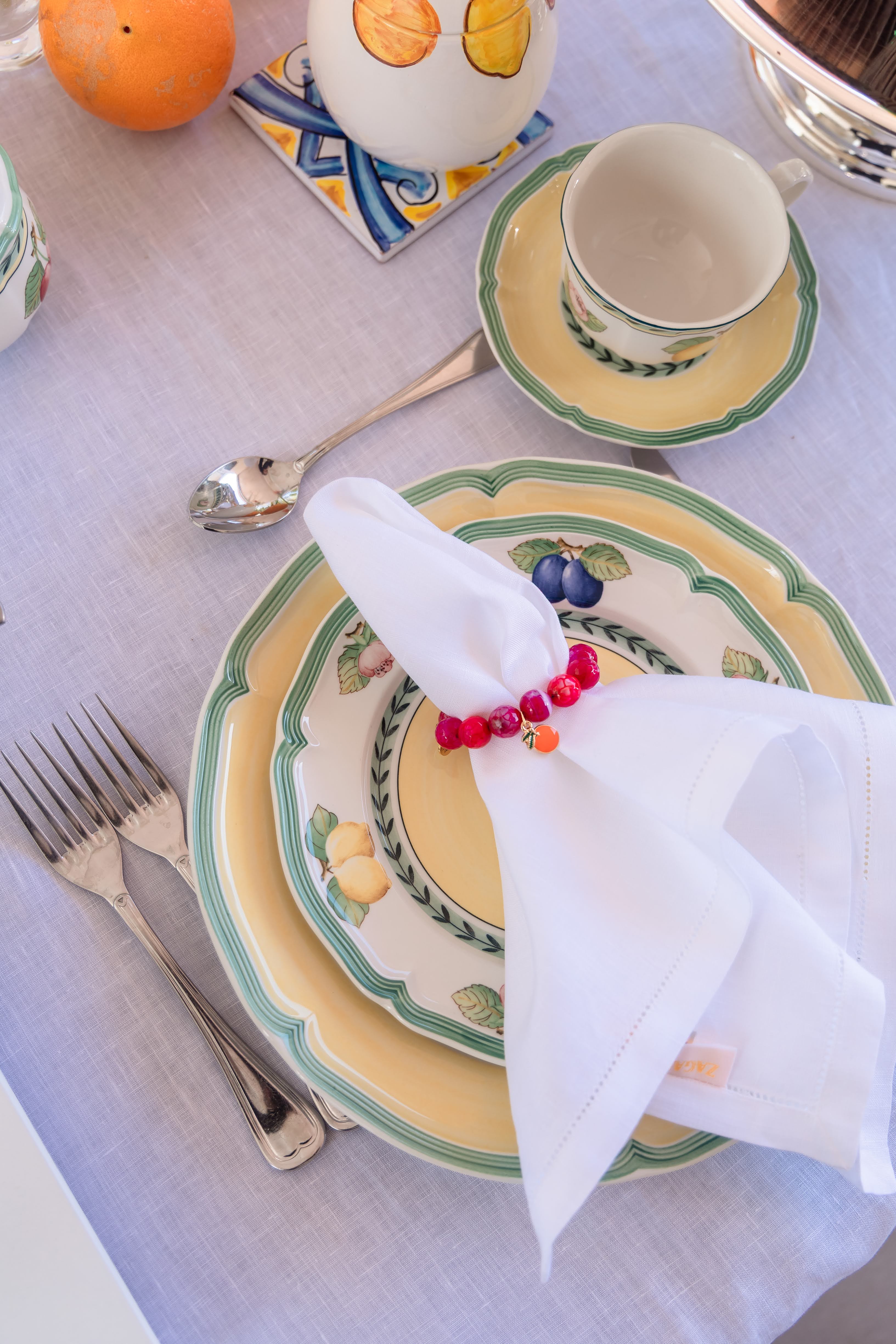 Magenta Jage semiprecious stone napkin ring with enameled orange tag (set of 4)